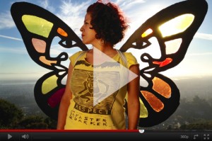 Artist Favianna and the symbol of the migrating Monarch Butterfly.