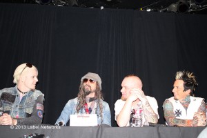 Rob Zombie second from left and Ivna Moody from Five Finger Death Punch 3rd from left with band members on either side at the press conference.