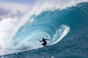 Kelly Slater in double-overhead barrels at Banzai Pipeline during the Volcom Pipe Pro. Photo by ASP/Bielmann.