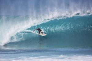 Kelly Slater dominating in double-overhead barrels at Banzai Pipeline, North Shore, during Volcom Pipe Pro in February, 2014.