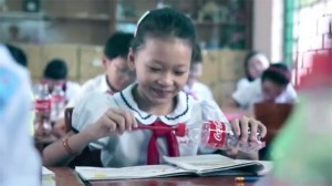 Hey, let's paint with a plastic Coke bottle with a different plastic cap, after drinking a sugary, fattening beverage!