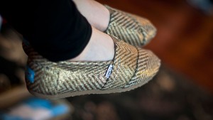 TOMs shoes sells half to Bain Capital.