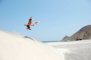 Kanoa Igarashi sand jump photo by Quiksilver.