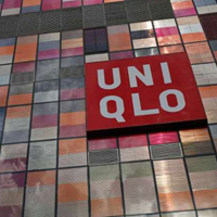 A company logo is seen on the exterior of a UNIQLO store at Taikoo Li Sanlitun shopping centre in Beijing